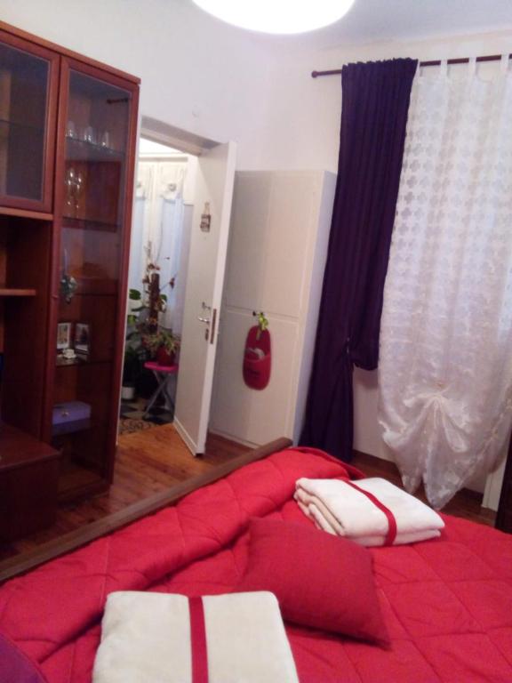 Łóżko lub łóżka w pokoju w obiekcie Casa Vacanze Poison