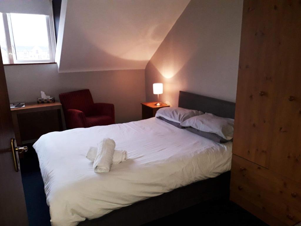 Кровать или кровати в номере Lwr Ormeau Guest House