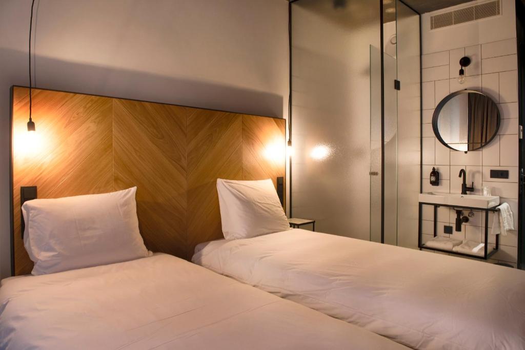 Postel nebo postele na pokoji v ubytování Hotel the Match