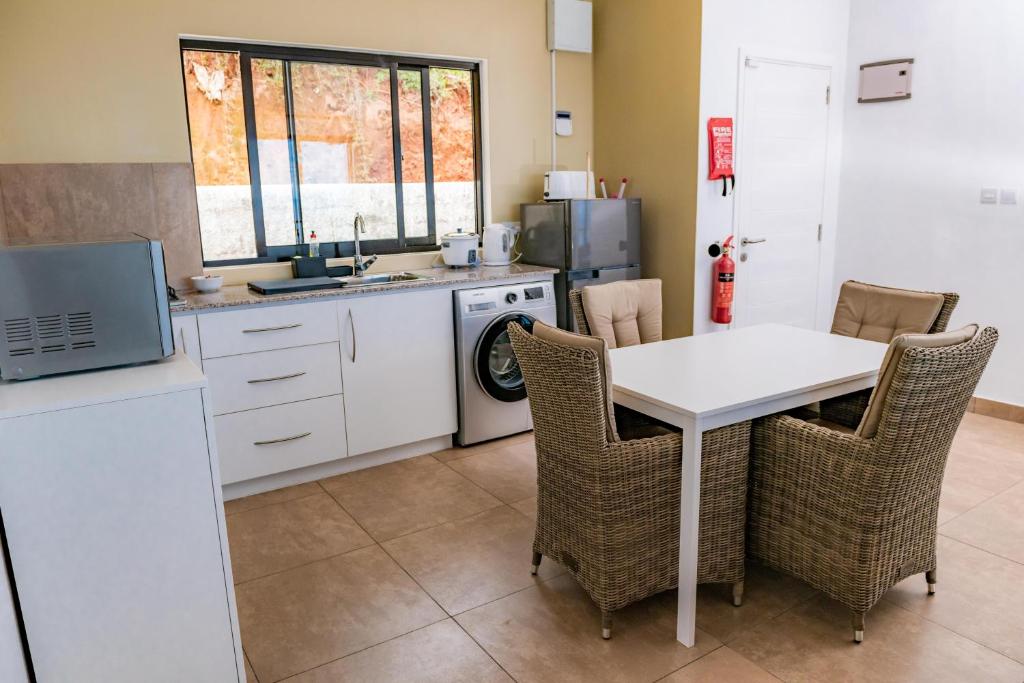 Kuchyň nebo kuchyňský kout v ubytování Villa Lima