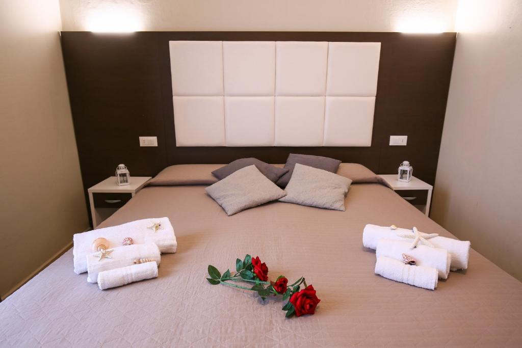 Postel nebo postele na pokoji v ubytování Hotel Bergamo
