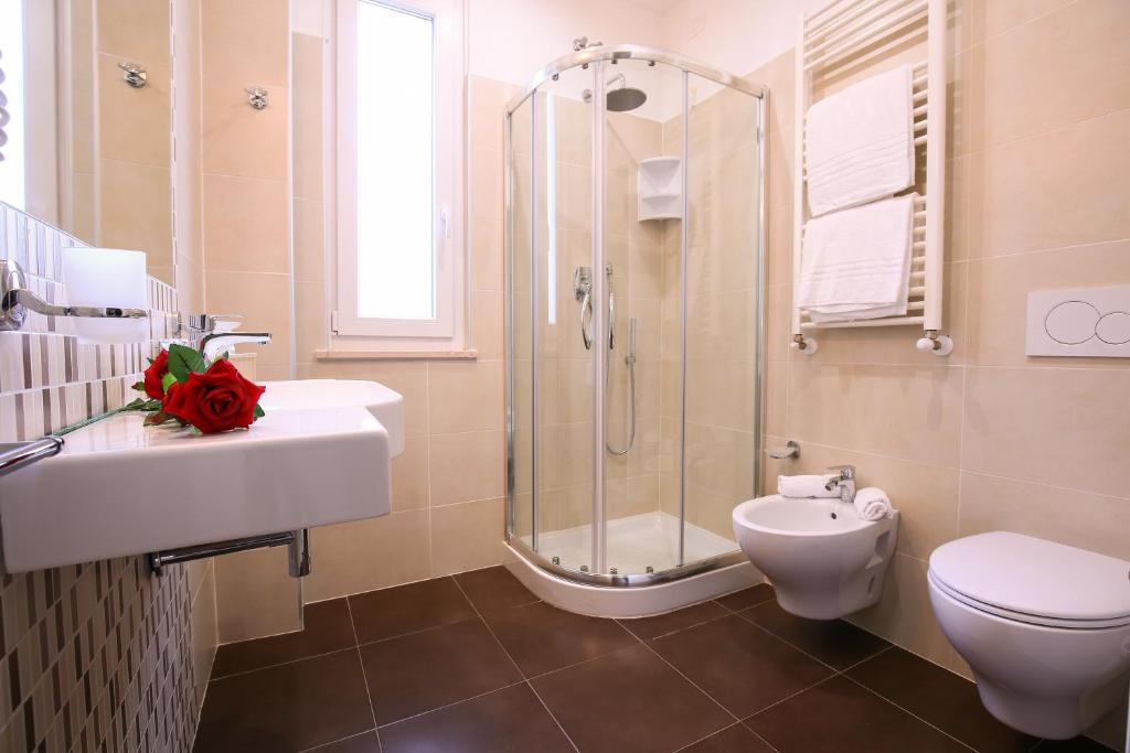Koupelna v ubytování Hotel Bergamo
