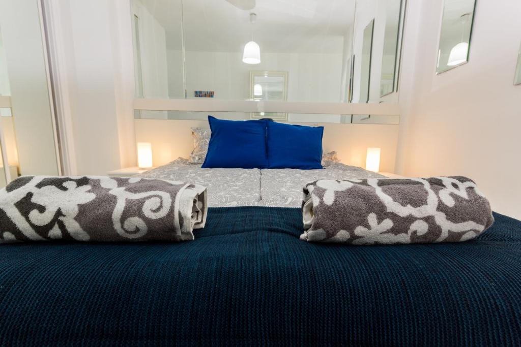 Postel nebo postele na pokoji v ubytování Blue Vista Apartment