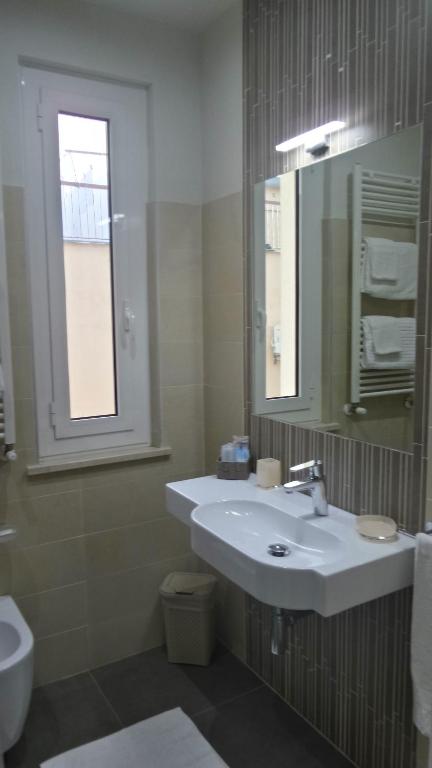 Koupelna v ubytování Hotel Bergamo