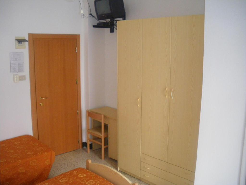 TV a/nebo společenská místnost v ubytování Hotel Ronconi