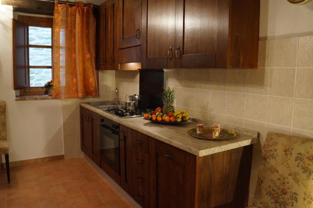 Kuchyň nebo kuchyňský kout v ubytování Frigino Agriturismo