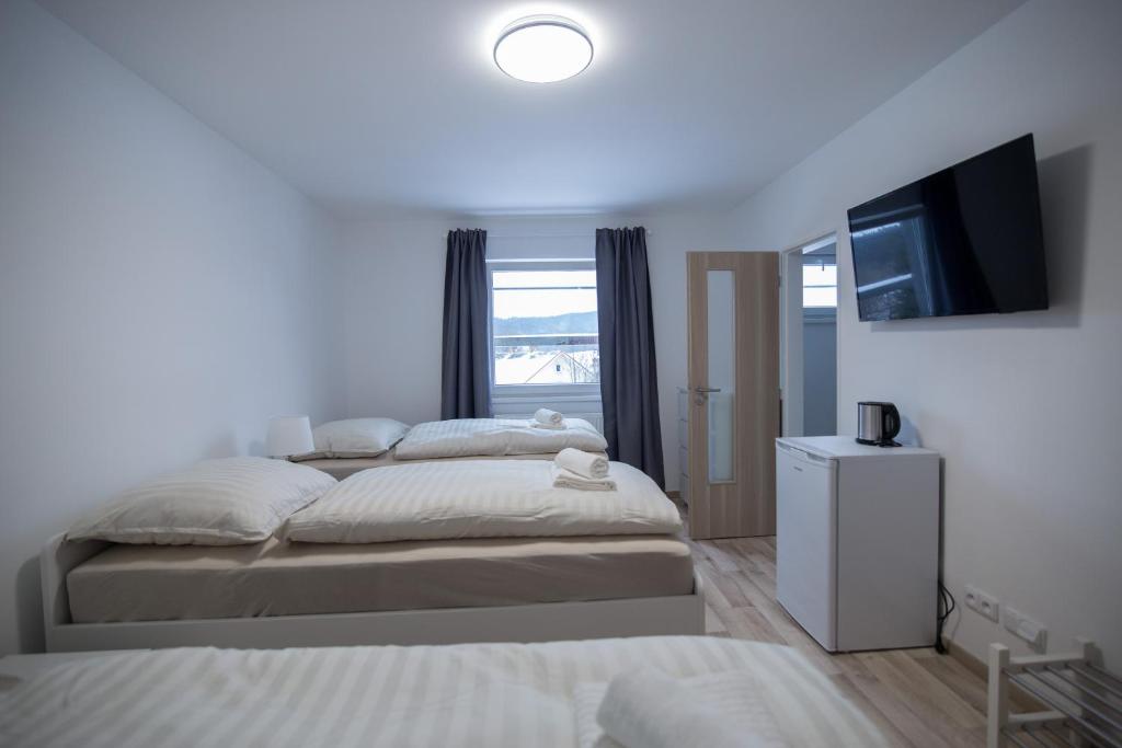 Postel nebo postele na pokoji v ubytování Apartmán Petra