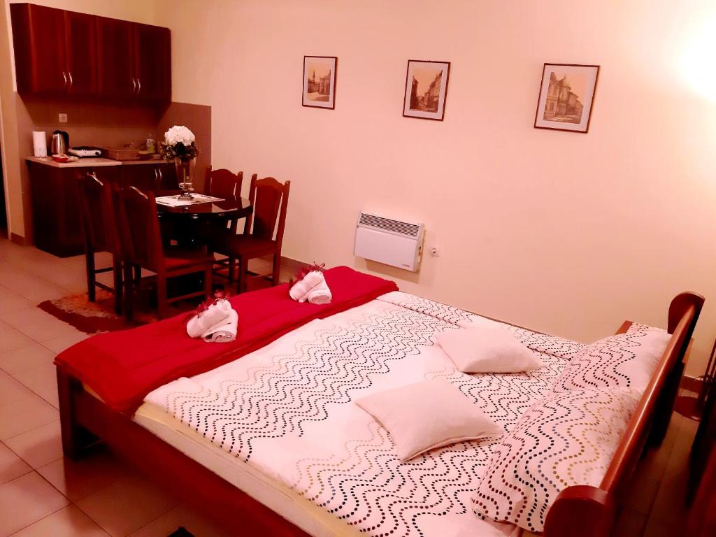 Postel nebo postele na pokoji v ubytování Guest House Villa Lord