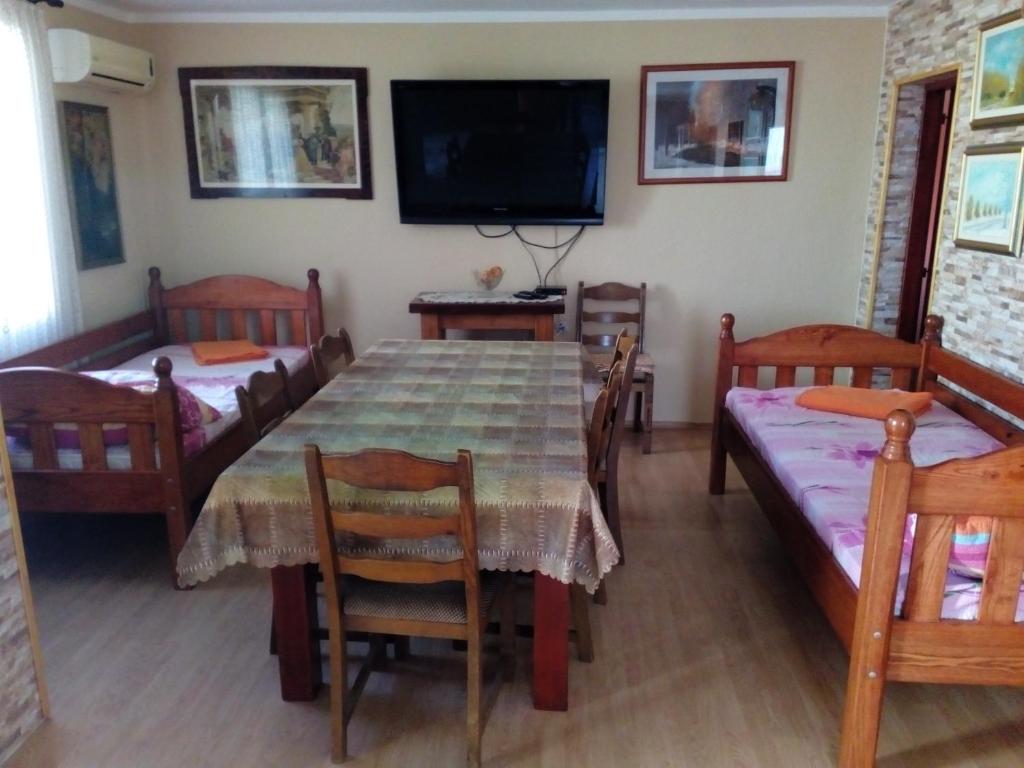 Postel nebo postele na pokoji v ubytování Apartment "Mislav"