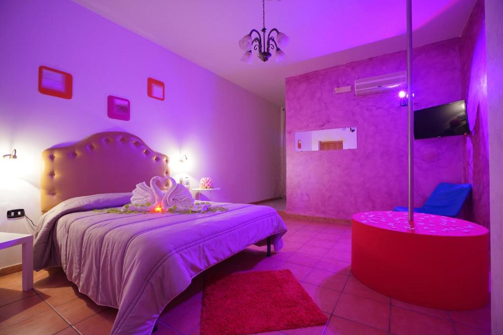 Postel nebo postele na pokoji v ubytování Hotel Stefany