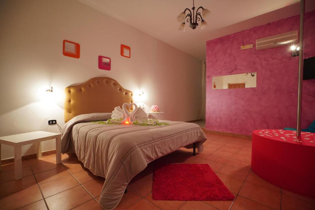 Postel nebo postele na pokoji v ubytování Hotel Stefany