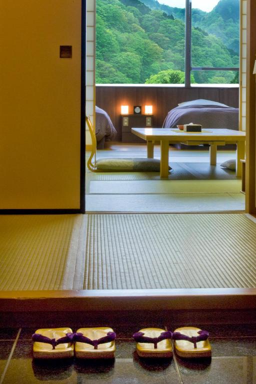 Postel nebo postele na pokoji v ubytování Nikko Senhime Monogatari