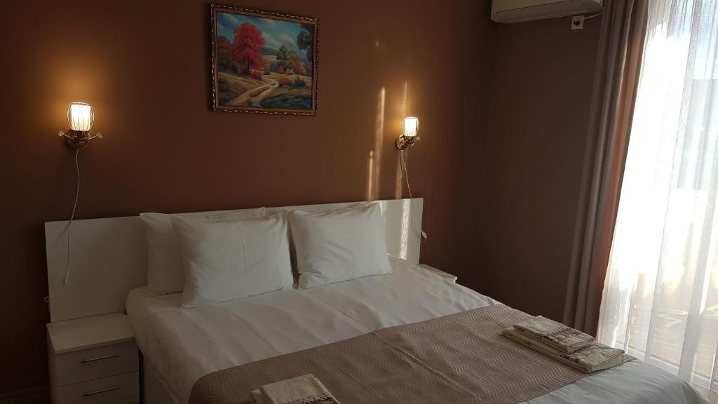 Postel nebo postele na pokoji v ubytování MARIANA - guest rooms