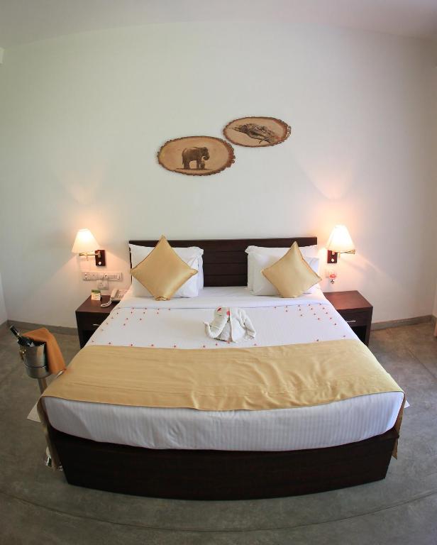 Postel nebo postele na pokoji v ubytování Grand Udawalawe Safari Resort