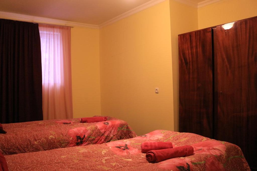 Postel nebo postele na pokoji v ubytování Inga Jafaridze Guesthouse Pele