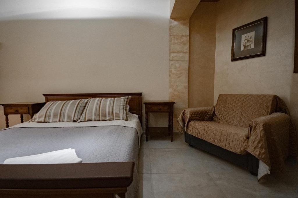 Postel nebo postele na pokoji v ubytování Hotel Dunav Požarevac