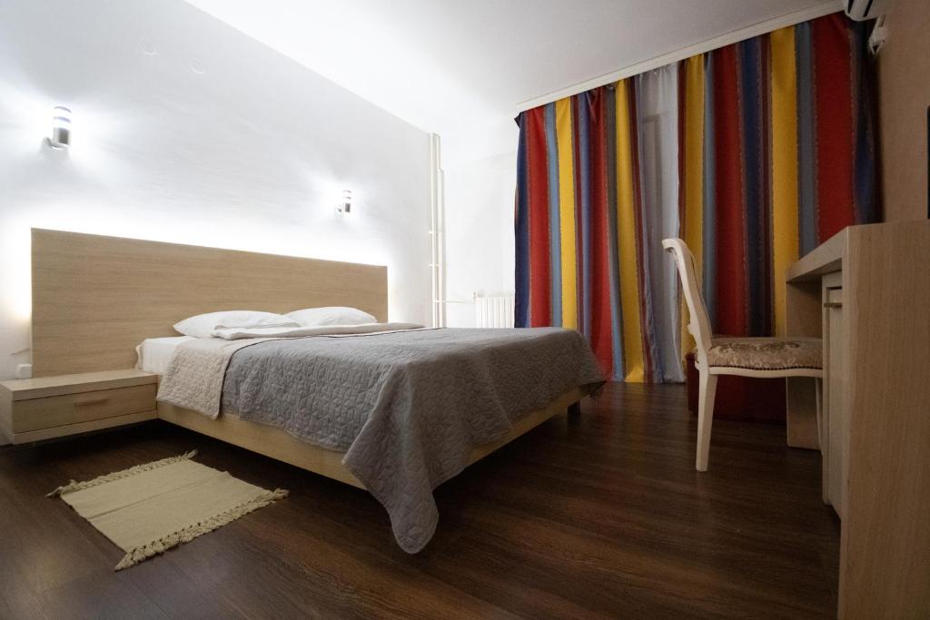 Postel nebo postele na pokoji v ubytování Hotel Dunav Požarevac