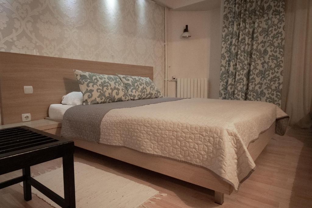 Postel nebo postele na pokoji v ubytování Hotel Dunav Požarevac