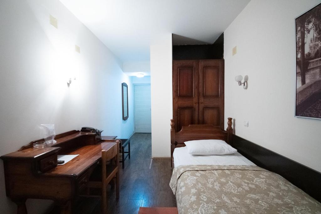 Postel nebo postele na pokoji v ubytování Hotel Dunav Požarevac
