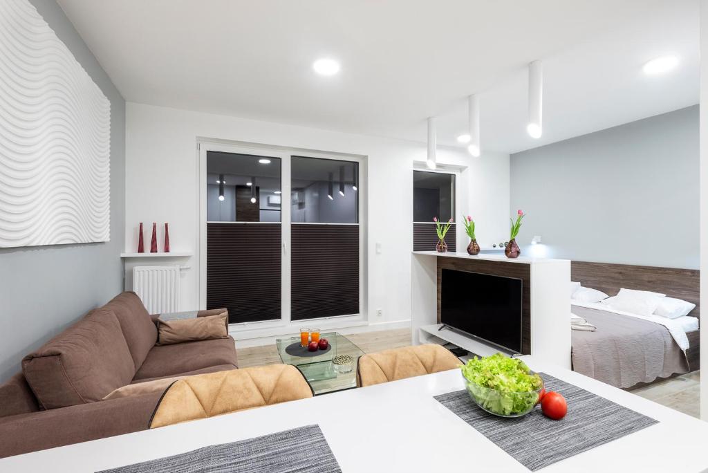 Posteľ alebo postele v izbe v ubytovaní Apartament Luxury Miedzyborska 8b