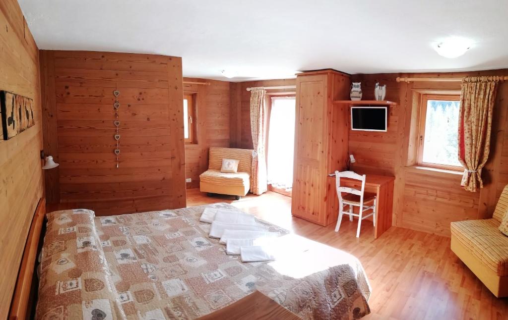 TV a/nebo společenská místnost v ubytování Hotel Paradisia