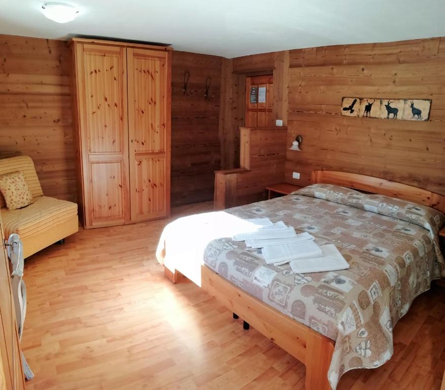 Postel nebo postele na pokoji v ubytování Hotel Paradisia
