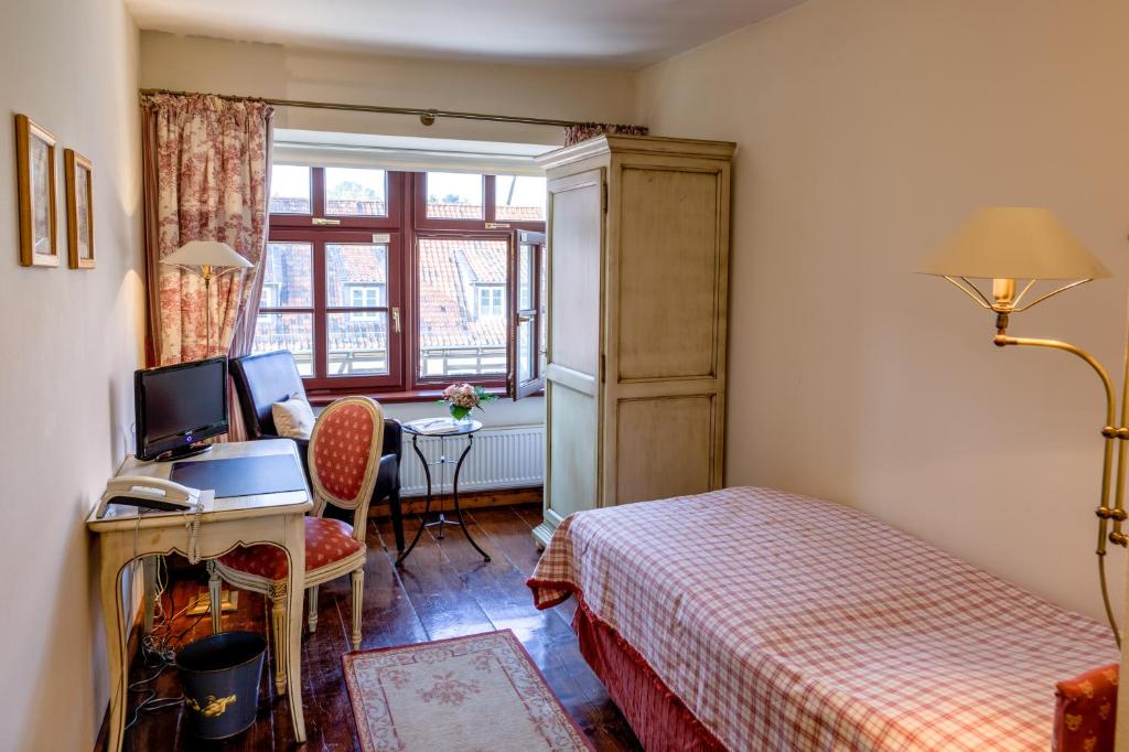 Postel nebo postele na pokoji v ubytování Hotel Zum Bär