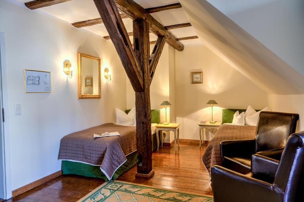 Postel nebo postele na pokoji v ubytování Hotel Zum Bär