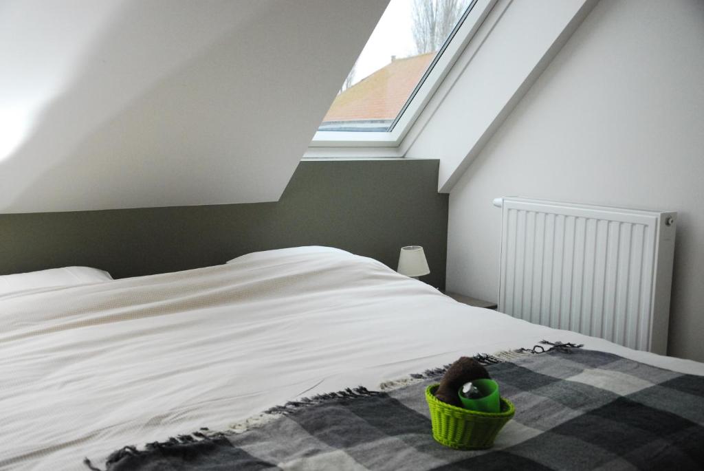 Postel nebo postele na pokoji v ubytování B&B Het Schaliënhof