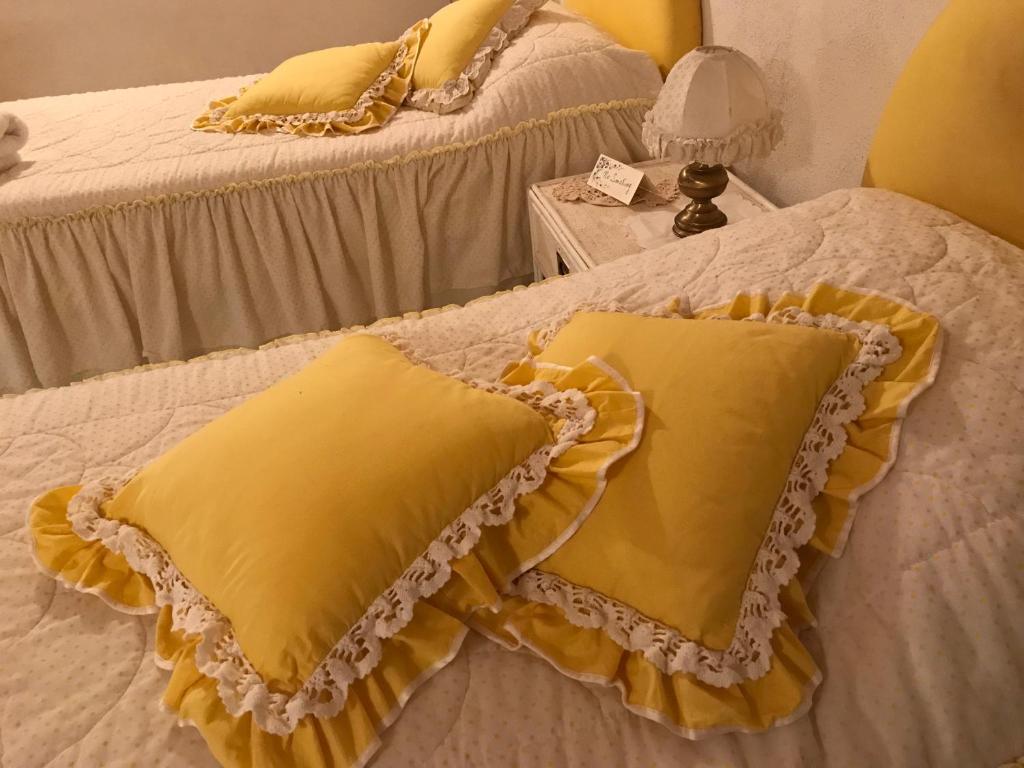 Postel nebo postele na pokoji v ubytování Villa Camilla