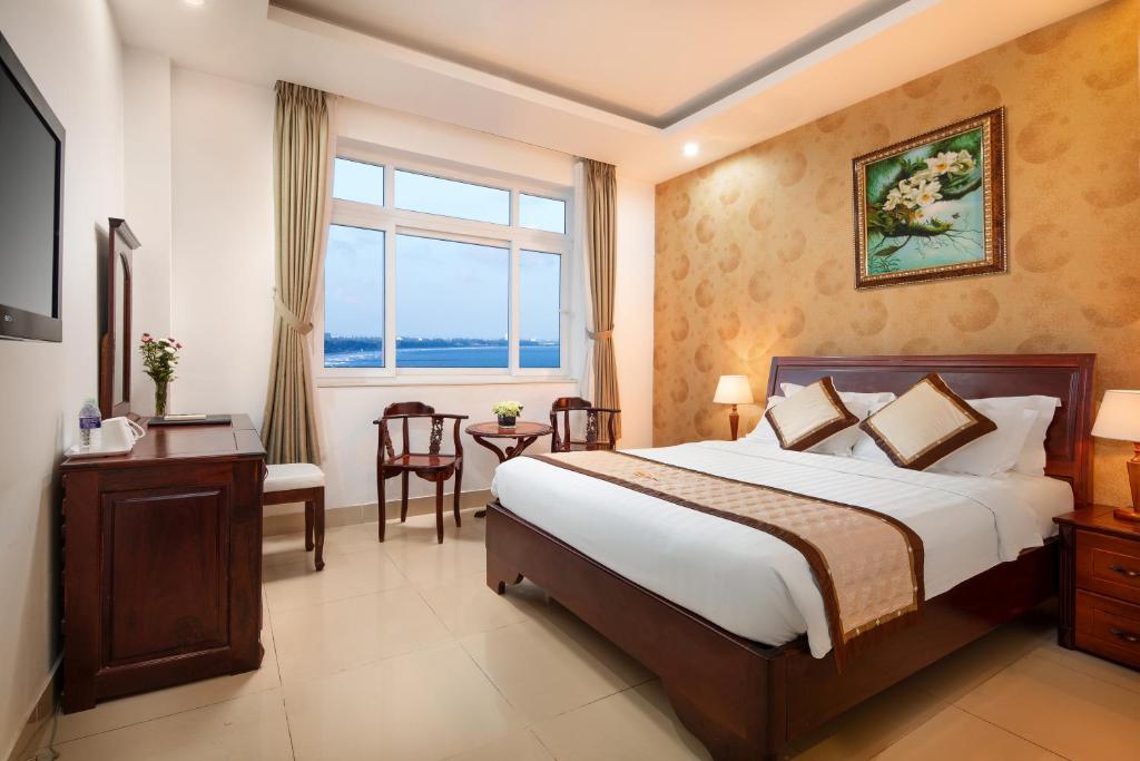 Postel nebo postele na pokoji v ubytování Corvin Hotel