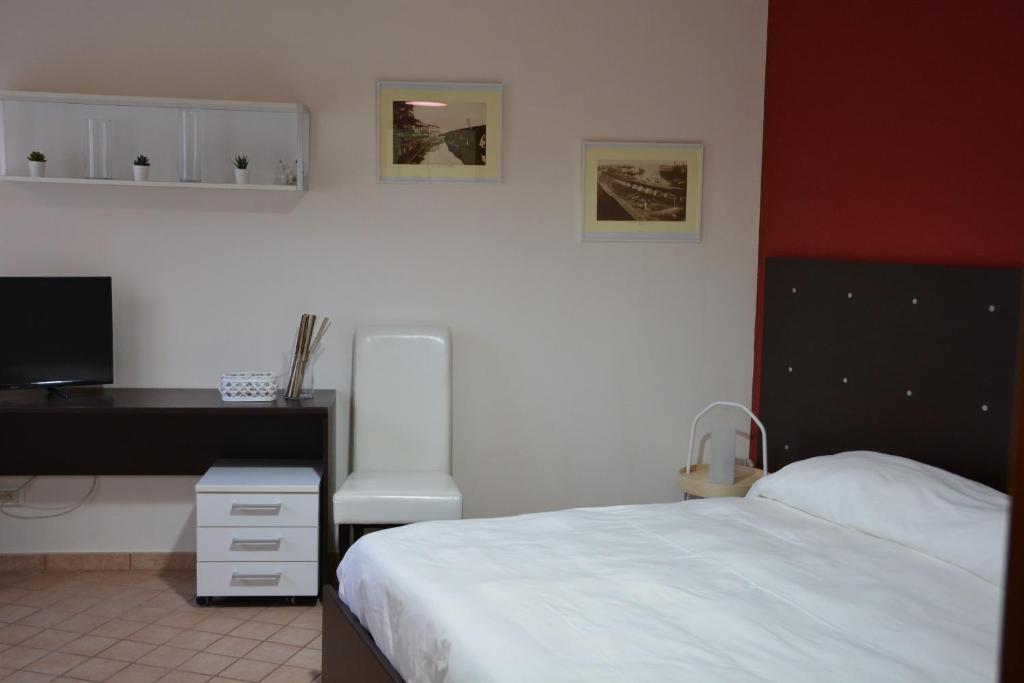 Postel nebo postele na pokoji v ubytování Garibaldi Flat