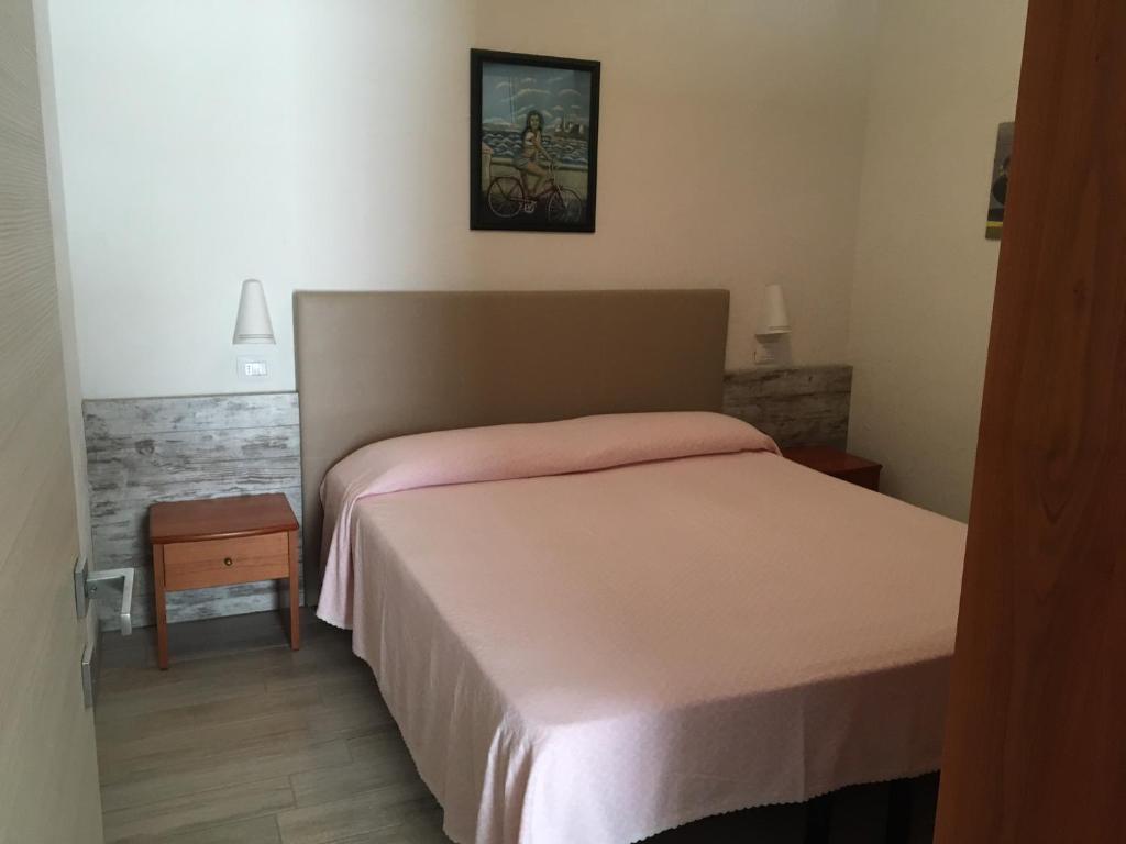 Postel nebo postele na pokoji v ubytování Hotel Splendid Mare