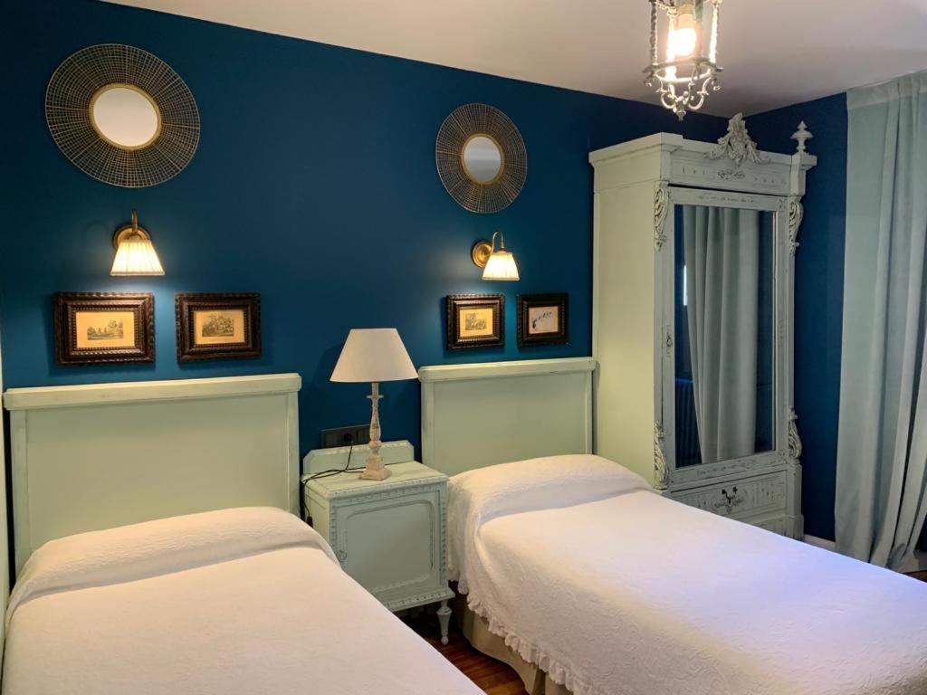Postel nebo postele na pokoji v ubytování Hotel Boutique Balaitus