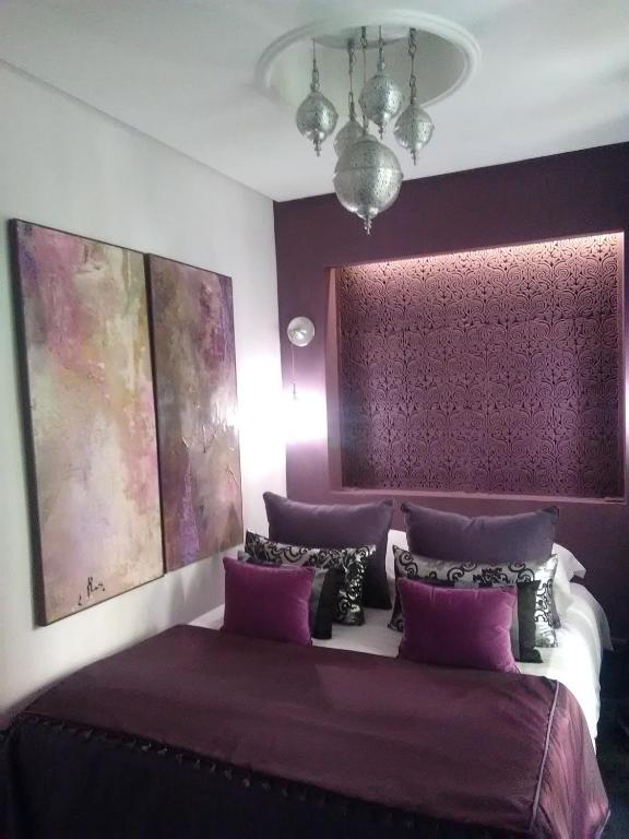 Postel nebo postele na pokoji v ubytování Riad Tchina