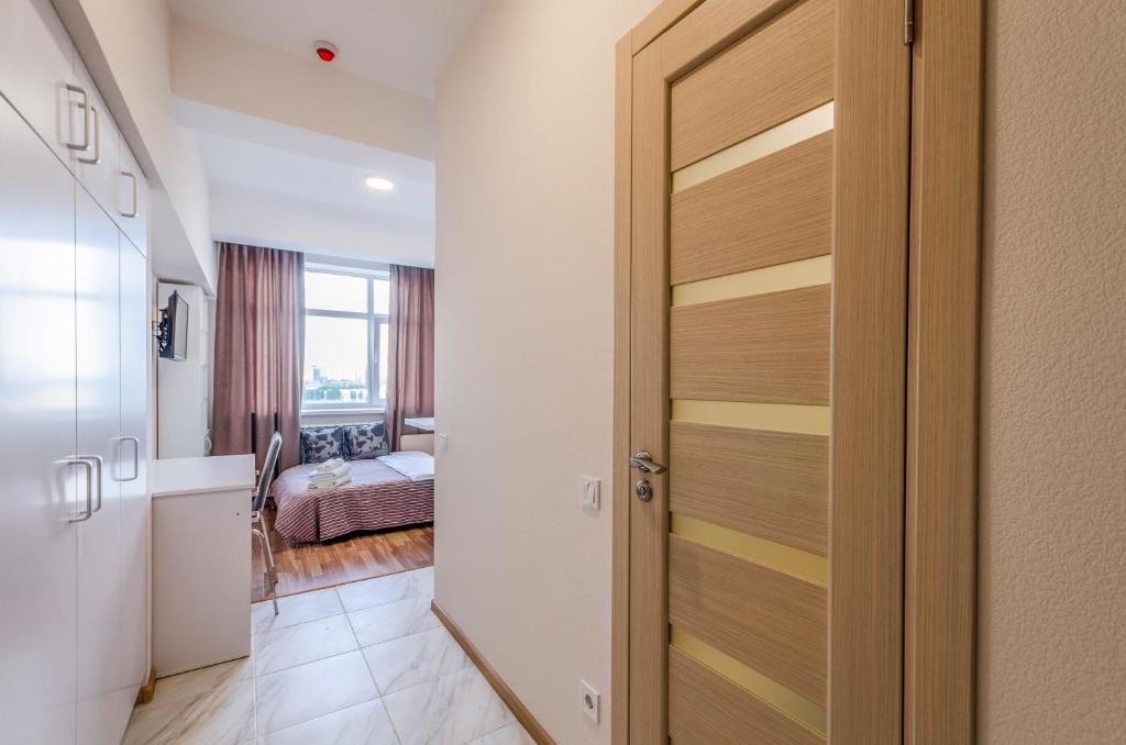 Postel nebo postele na pokoji v ubytování Home Inn