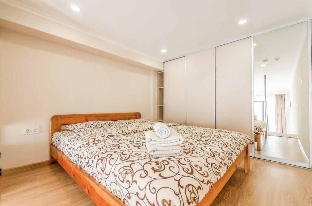 Postel nebo postele na pokoji v ubytování Home Inn