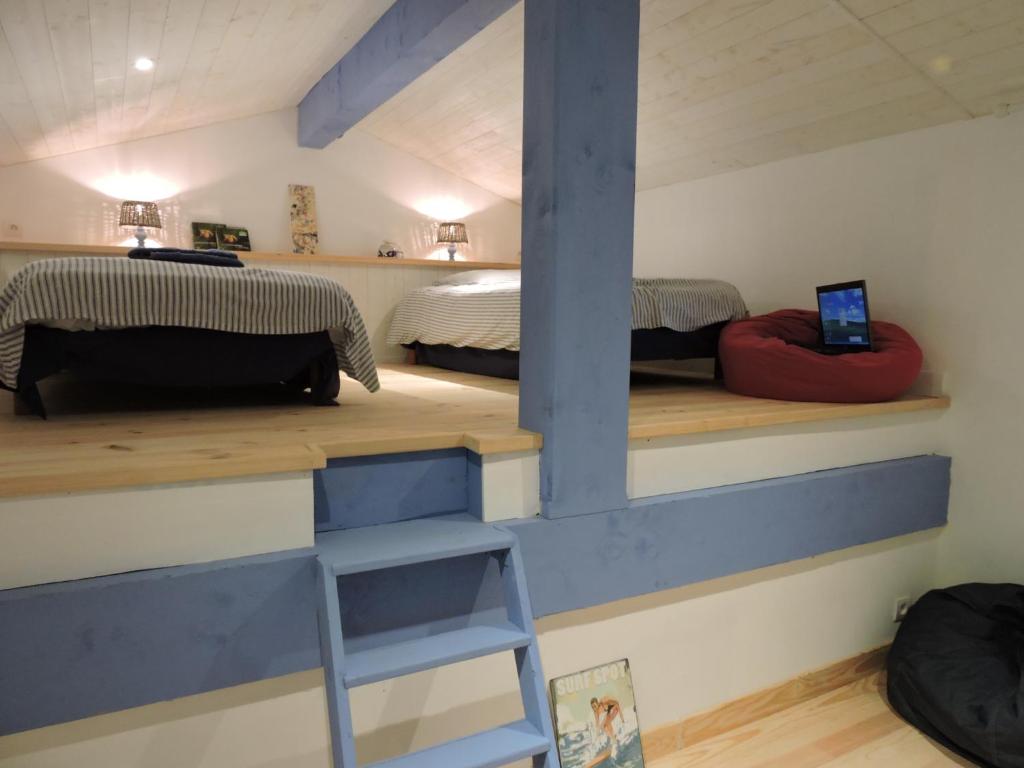 Postel nebo postele na pokoji v ubytování Domaine Le Castelet
