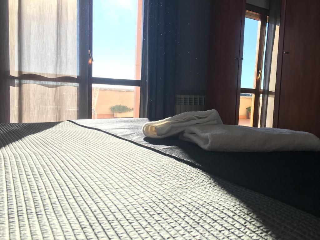 Postel nebo postele na pokoji v ubytování Hostal Casa Barranco