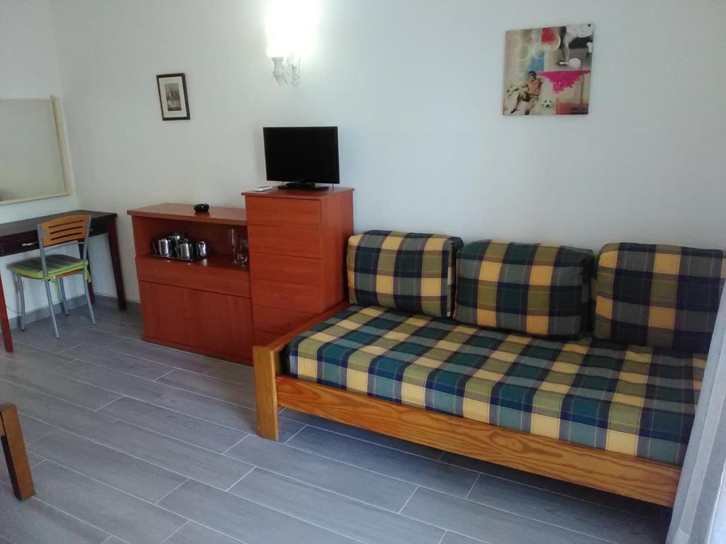TV a/nebo společenská místnost v ubytování Apartamentos Leziria