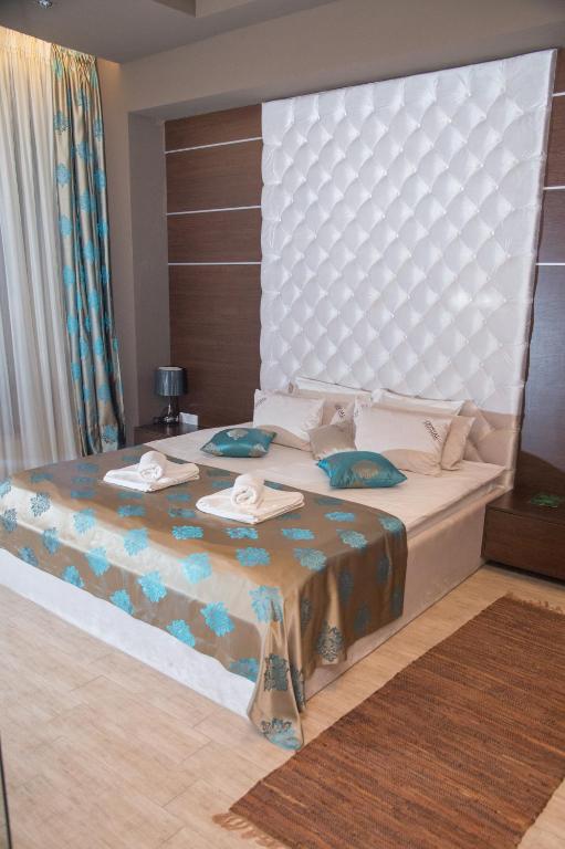 Postel nebo postele na pokoji v ubytování Hotel Crystal