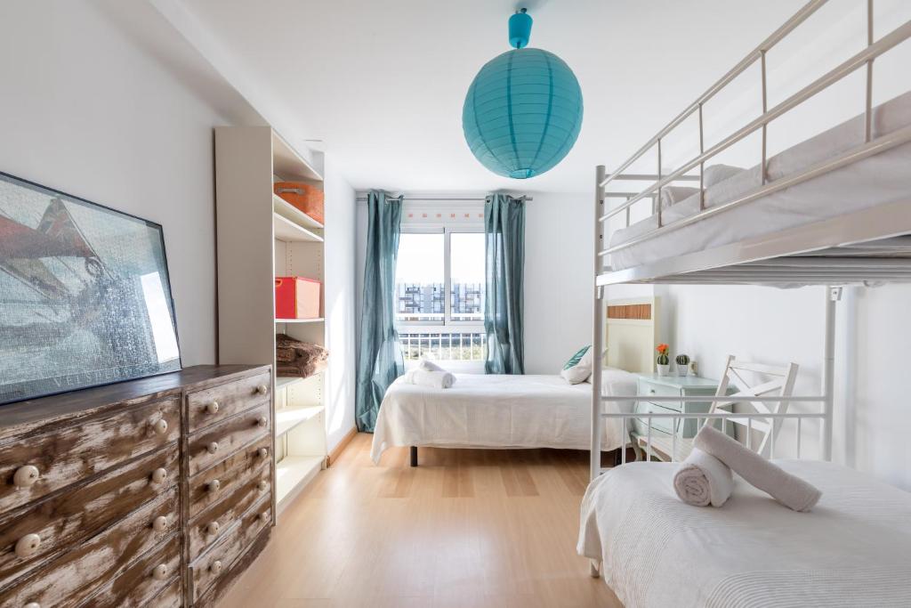 Postel nebo postele na pokoji v ubytování Apartamento Calipso