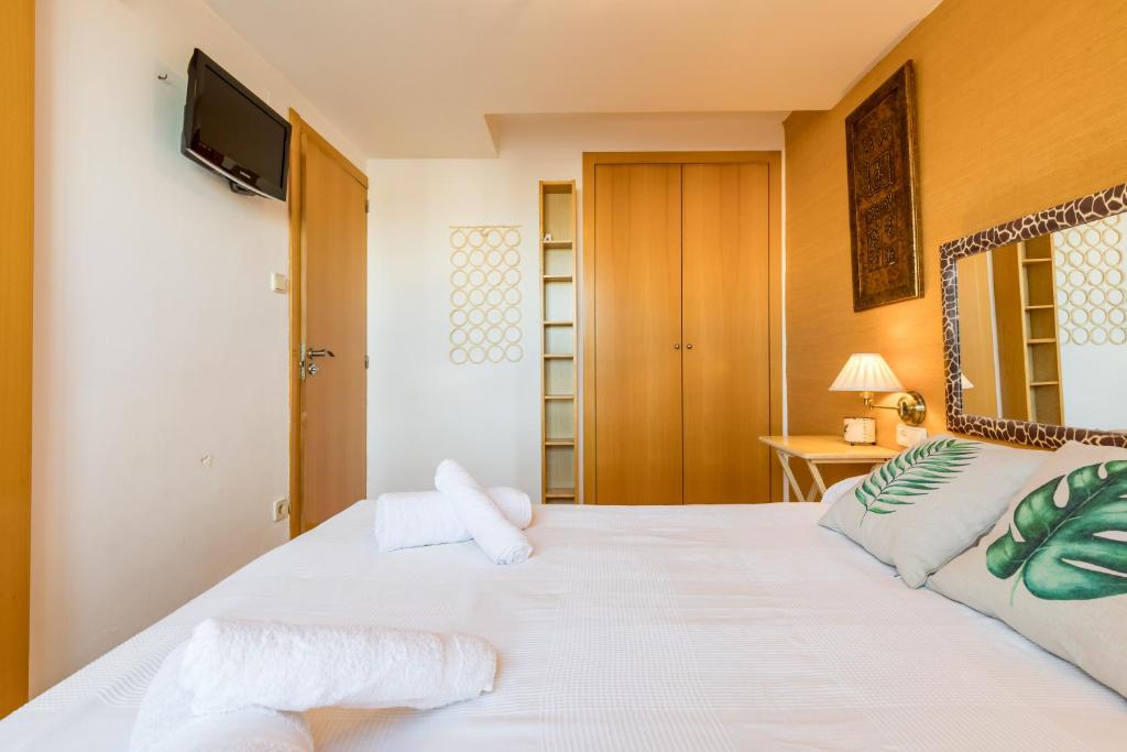 Postel nebo postele na pokoji v ubytování Apartamento Calipso