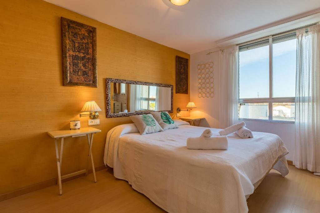 Postel nebo postele na pokoji v ubytování Apartamento Calipso