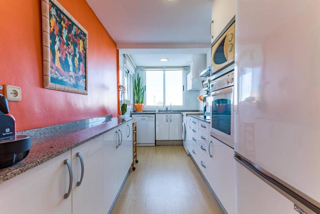 Kuchyň nebo kuchyňský kout v ubytování Apartamento Calipso