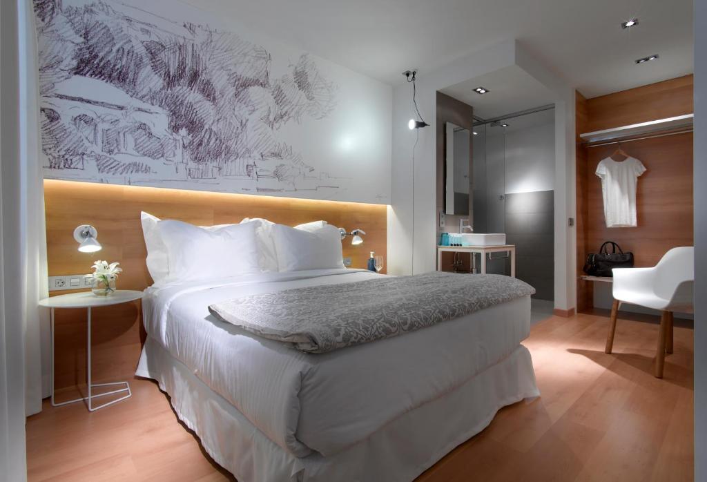 Postel nebo postele na pokoji v ubytování Hotel Boutique Párraga Siete