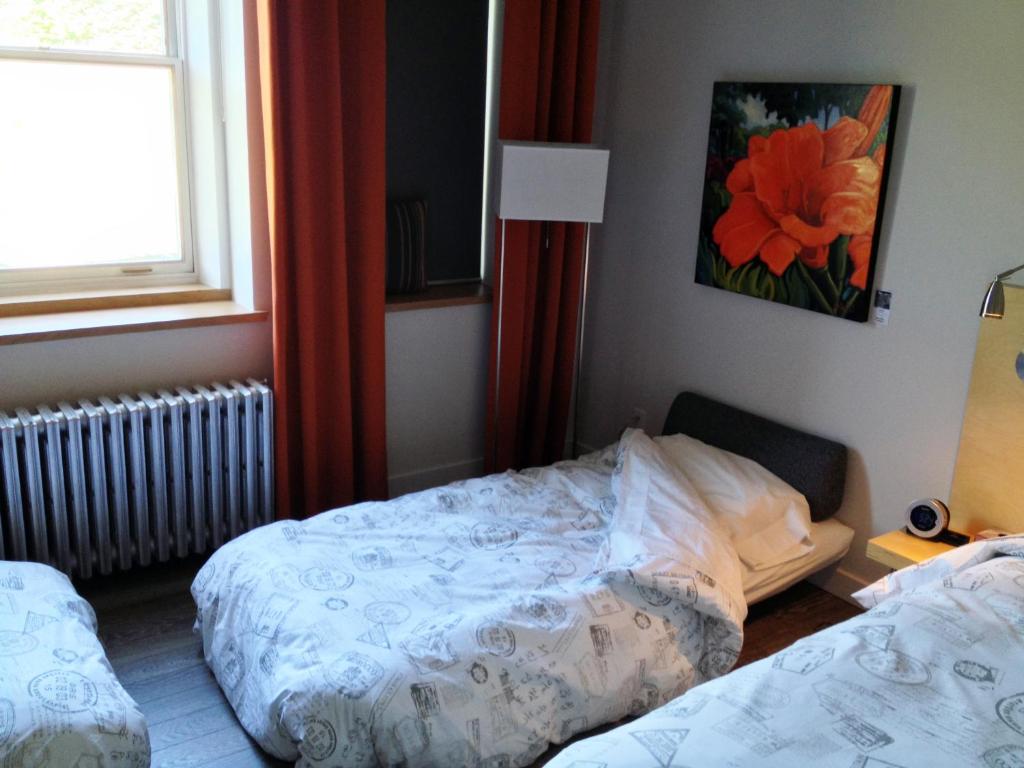 Postel nebo postele na pokoji v ubytování Suite Marie-Thérèse