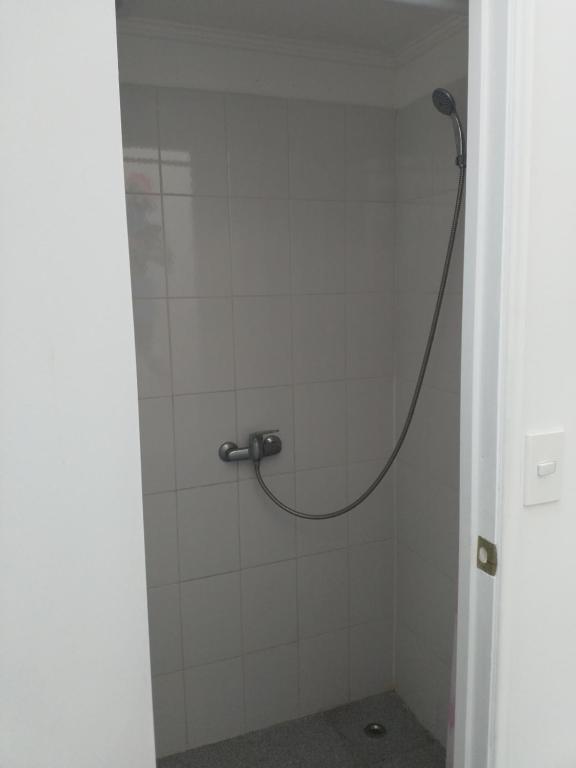 Koupelna v ubytování Escarabajo Hostel