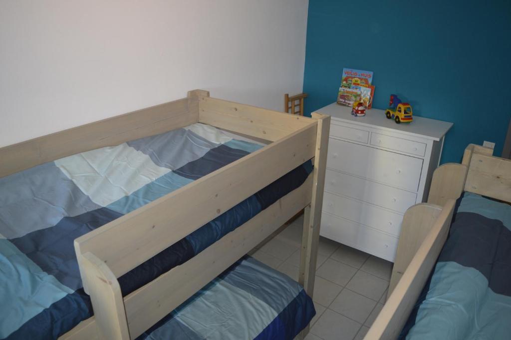 Postel nebo postele na pokoji v ubytování Residentie Paola