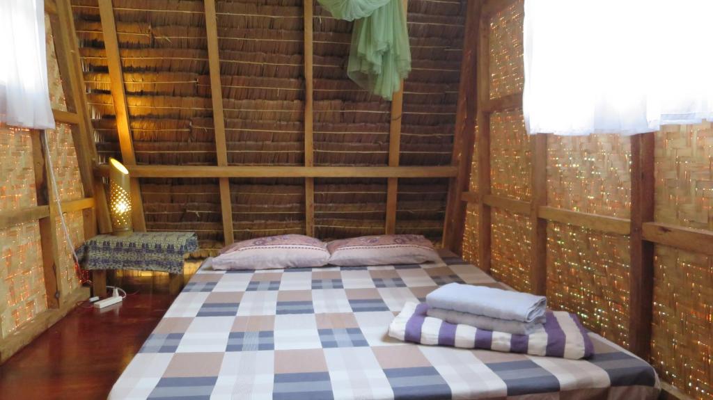 Ein Bett oder Betten in einem Zimmer der Unterkunft Lazy Lizard Hostel
